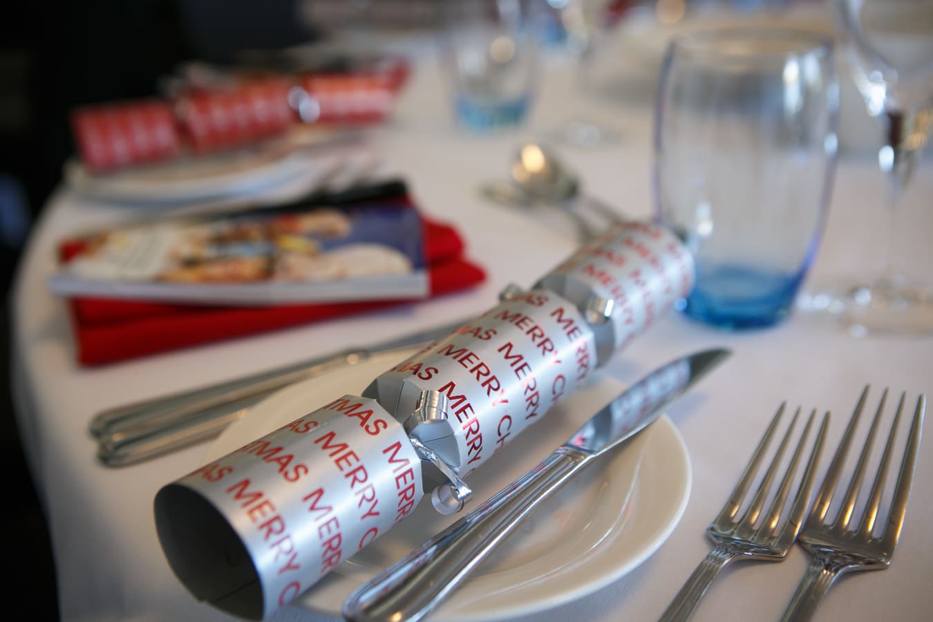 A close up of a Christmas cracker on a table